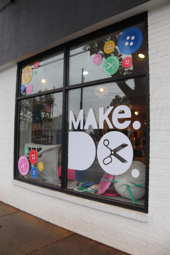 a photo of the make do signage